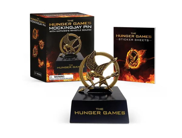 The Hunger Games Mockingjay Pin poster